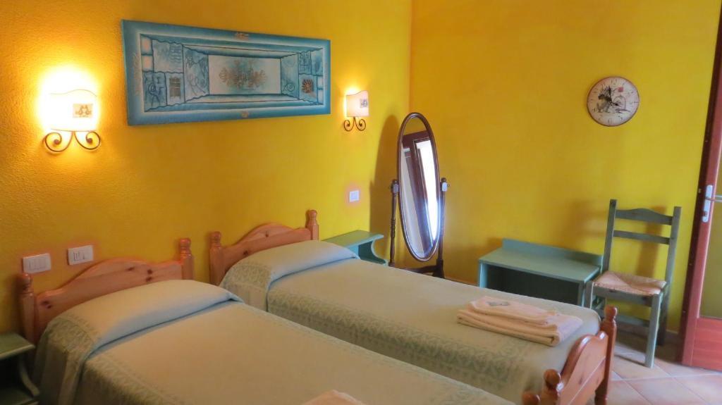 Il Viandante Hotel ซาน เตโอโดโร ห้อง รูปภาพ
